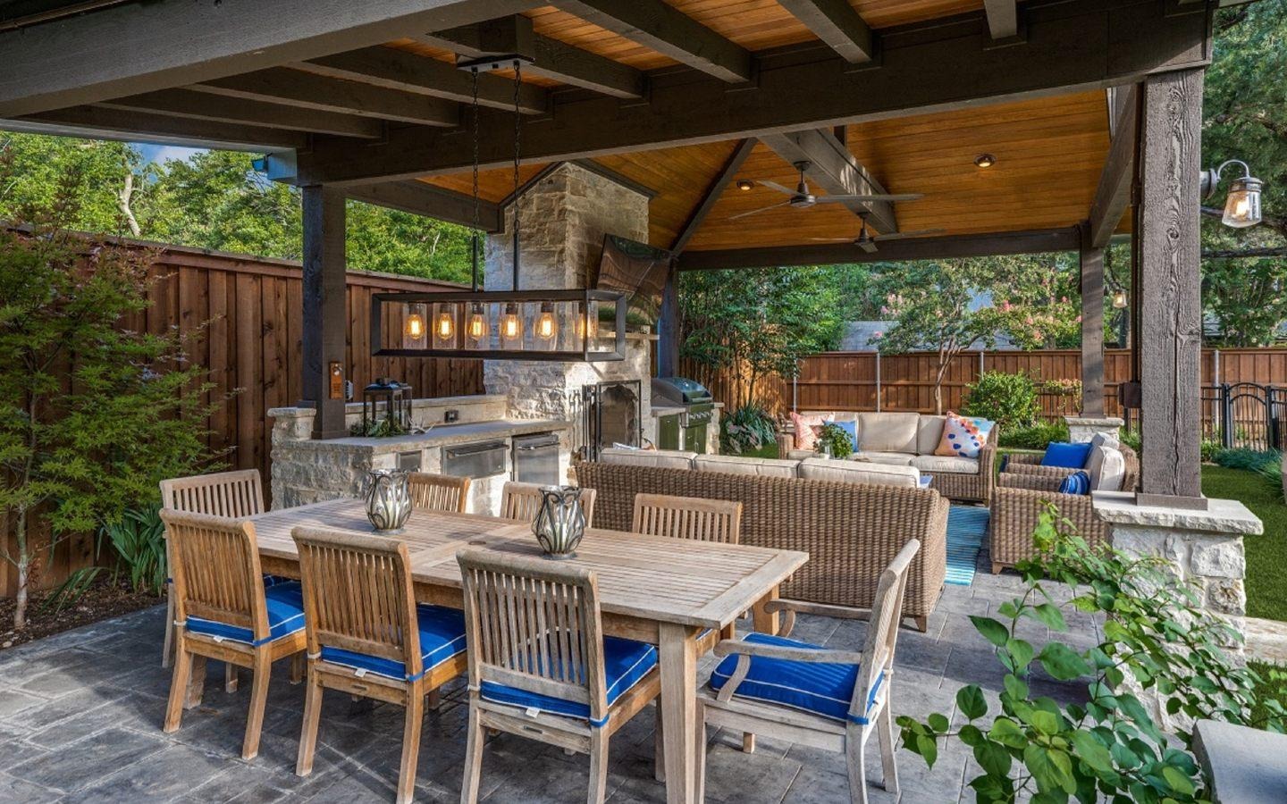 A patio with chairs and a tableAI-generated content may be incorrect.